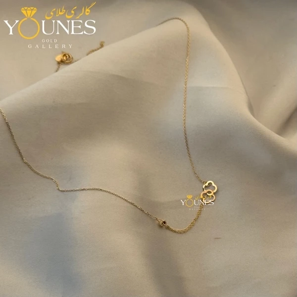 تصویر دوم گردنبند طلا ونکلیف حلقه و گوی